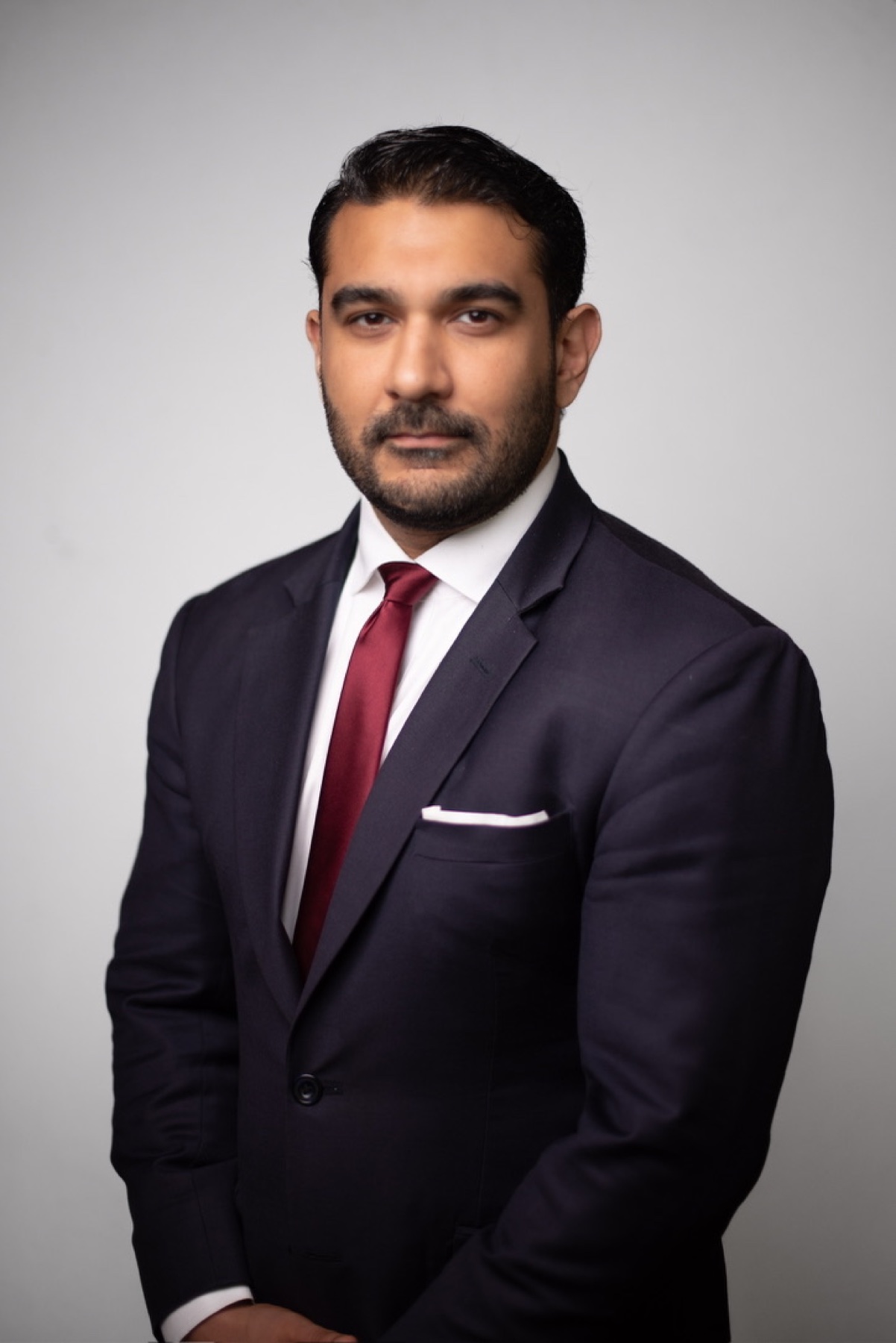 Official portrait of Hasaan Raza